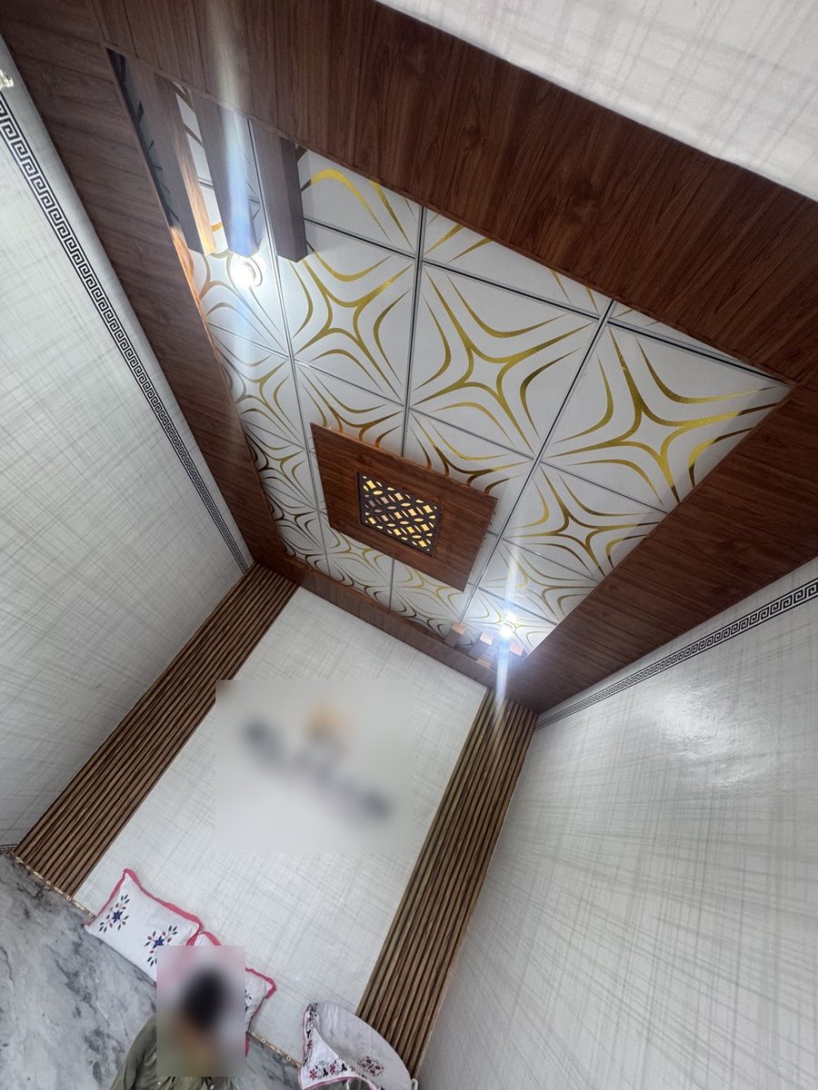 Fancy ceiling installed in a residential room by PRINT POINT